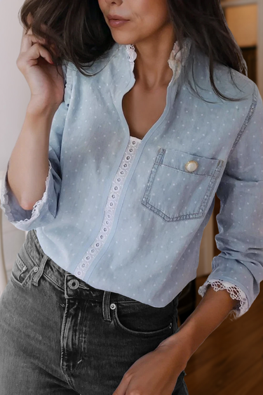 Light blue polka dot button-up blouse with lace trim and pearl button pocket – women’s chic casual top